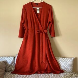 Torrid faux wrap dress. 3/4 sleeve. Wrap tie.comfortable & stretchy. Size 0